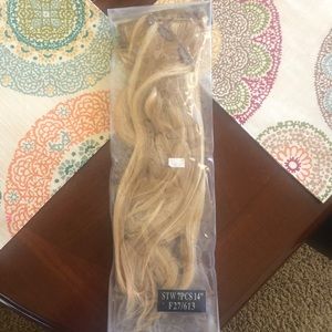 Blonde medium length hair extensions